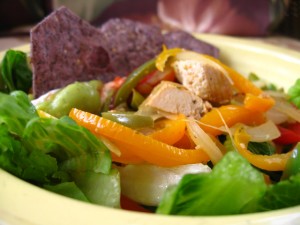 Rainbow Chicken Fajita Salad with Jalapeño-Scented Sour Cream